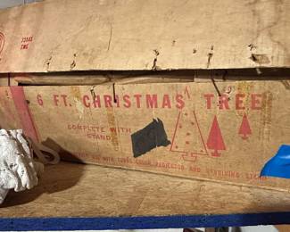 6ft aluminum tree with stand and in original sleeves