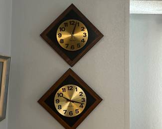 Several wall clocks