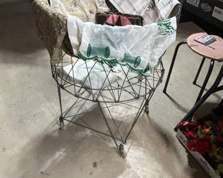 Vintage rolling and folding laundry basket