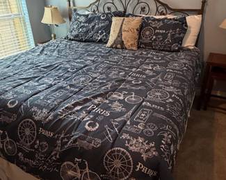 Wrought Iron Queen Bed Frame with Paris Themed Bedding