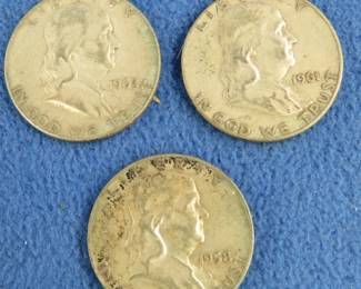 Lot 306. 1958, 1961, and 1962 Franklin half dollars