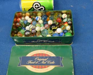 Lot 369. Marbles in a tin box