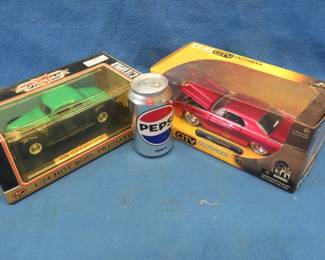 Lot 77. Two 1:24 die cast cars: Red Box1940 Ford Coupe. Dub City Old School 1963 Thunderbird