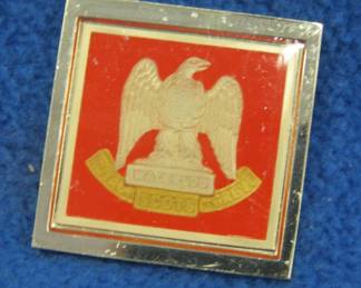 Lot 159. Franklin Mint's sterling silver The Royal Scots Greys United Kingdom ingot from "The World's Greatest Regiments" weighing 14.73 grams.. All 50 emblems and the wooden display case will be sold separately in this auction