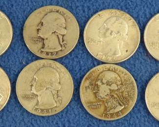 Lot 61. Eight silver Washington Quarters