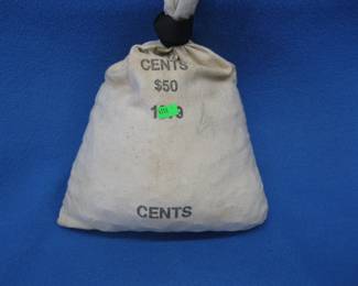 Lot 445. 5000 Lincoln wheat pennies in a cloth bank bag. Approx. weight of 33 lbs.