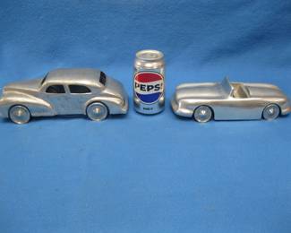 Lot 383. Two unique cast aluminum cars