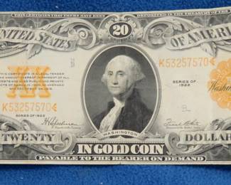 Lot 161. $20 Gold Certificate Series 1922 SN K53257570 signed by Harley V. Speelman (Register of the Treasury) and Frank White (Treasurer of the United. States). Gold certificates like this one were issued by the U.S. government between 1863 and 1933, representing ownership of actual gold coin at the. time’s fixed rate. They were legal tender and could be redeemed for gold until the U.S. suspended gold redemption in 1933