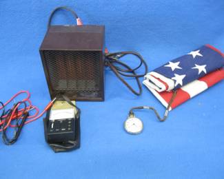 Lot 434. Small electric heater, flag, voltmeter, and a working pocket watch with a cracked face