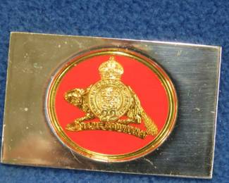 Lot 56. Franklin Mint's sterling silver Royal 22nd Regiment Canada ingot from "The World's Greatest Regiments" weighing 23.44 grams.. All 50 emblems and the wooden display case will be sold separately in this auction