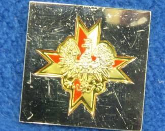 Lot 154. Franklin Mint's sterling silver 1st (Krechowiecki) Lancers Poland ingot from "The World's Greatest Regiments" weighing 14.77 grams.. All 50 emblems and the wooden display case will be sold separately in this auction