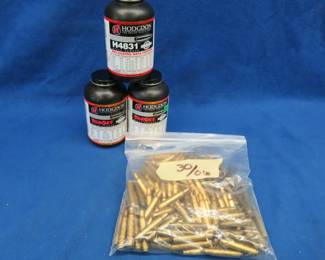 Lot 414. 30-06 casings and gun powder, two 1-pound cans of Hodgdon Rifle Powder, and an open can of Hodgdon H4831powder (total weight is just over. 5-oz)