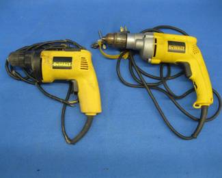 Lot 381. Two DeWalt variable speed electric drills. 3/8" and 1/2". Power cord on the 3/8" should be replaced.
