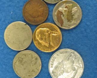Lot 29. Coin stew including a bordello coin