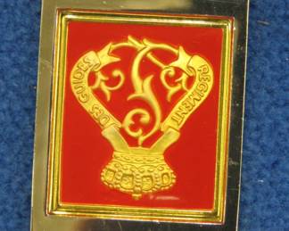 Lot 54. Franklin Mint's sterling silver 1st Guides Regiment Belgium ingot from "The World's Greatest Regiments" weighing 23.36 grams.. All 50 emblems and the wooden display case will be sold separately in this auction