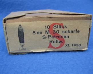 Lot 90. WW2 era German 8mm ammunition in original sleeve. Includes Waffenamt stamp.