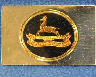 Lot 55. Franklin Mint's sterling silver The Royal Canadian Dragoons Canada ingot from "The World's Greatest Regiments" weighing 23.58 grams.. All 50 emblems and the wooden display case will be sold separately in this auction