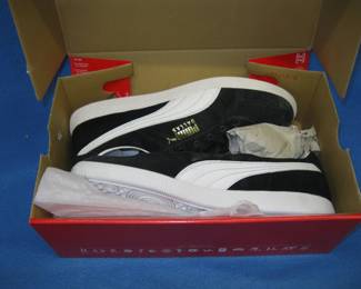 Lot 399. Puma Dallas tennis shoes. Appear to be unworn. Size 10.5 US.