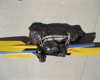 Lot 423. Owner applied sticker says "Two (2) one man flotation rafts with one pair of oars for each". We did not open the bag.