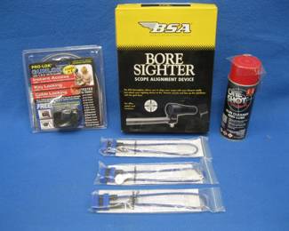 Lot 225. BSA bore sight kit, gun locks, and gun cleaner