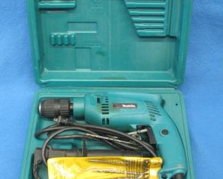 Lot 377. Makita 1/2" hammer drill with bits