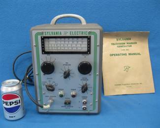 Lot 467. Sylvania Type 501 television marker generator with a manual. Untested.