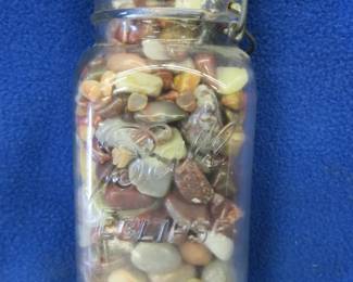 Lot 368. Polished agates in a Ball canning jar