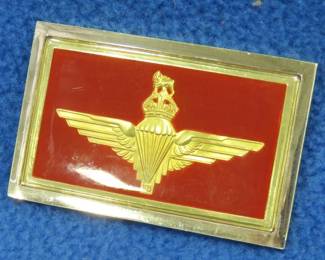 Lot 104. Franklin Mint's sterling silver The Parachute Regiment United Kingdom ingot from "The World's Greatest Regiments" weighing 23.41 grams.. All 50 emblems and the wooden display case will be sold separately in this auction
