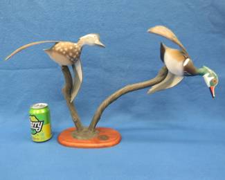 Lot 14. 1990-1991 Special Edition Ducks Unlimited hen and drake wood ducks in flight. Resin?