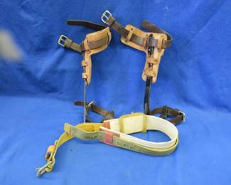 Lot 135. Pole climbing spikes and belt