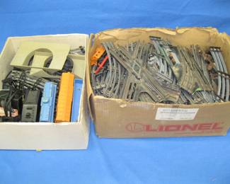 Lot 291. Two large boxes of model train track and more