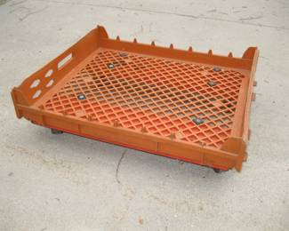 Lot 313. Rolling cart with steel frame and plastic top. 26" x 22" x 8".