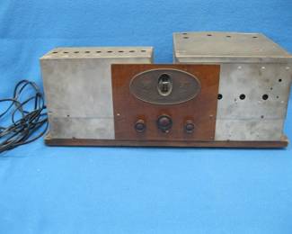 Lot 230. Silver Radio for parts or repair. Some tubes light up.