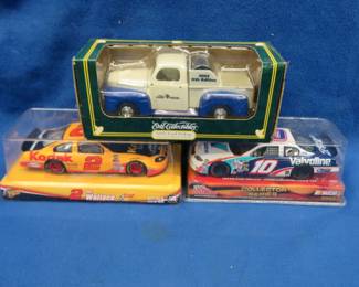 Lot 88. Two NASCAR die-cast cars and a Fleet Farm collectible truck by Ertl