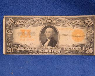 Lot 163. $20 Gold Certificate Series 1922 SN K44515509 signed by Harley V. Speelman (Register of the Treasury) and Frank White (Treasurer of the United. States). Gold certificates like this one were issued by the U.S. government between 1863 and 1933, representing ownership of actual gold coin at the. time’s fixed rate. They were legal tender and could be redeemed for gold until the U.S. suspended gold redemption in 1933