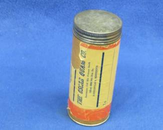 Lot 133. Vintage cardboard tube that once held The Oscar Quam Co. call