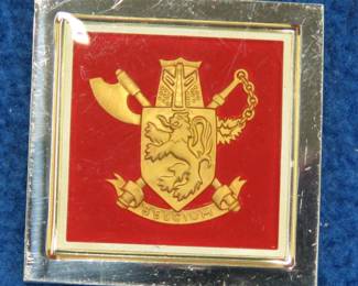 Lot 53. Franklin Mint's sterling silver 3rd Battalion Para-Commando regiment Belgium ingot from "The World's Greatest Regiments" weighing 14.78. grams.. All 50 emblems and the wooden display case will be sold separately in this auction