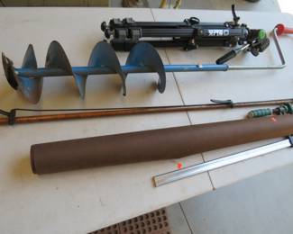 Lot 335. Ice auger guaranteed to start, extra long grabber, clamp, tripod, and more