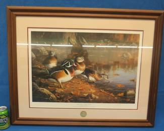 Lot 20. 1991 Ducks Unlimited Artist of the Year James Hautman's print "Quiet Pool-Wood Ducks". Framed, signed, numbered, and double-matted. 34" x. 27".