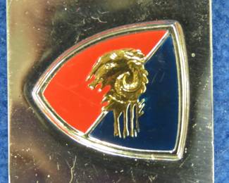 Lot 108. Franklin Mint's sterling silver Ariete Armoured Division Italy ingot from "The World's Greatest Regiments" weighing 14.61 grams.. All 50 emblems and the wooden display case will be sold separately in this auction