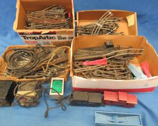 Lot 43. Two transformers (untested) and four boxes of model train track and accessories