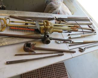 Lot 321. Old unique and unidentified tools including a True Temper broadhead ax and more