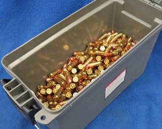 Lot 471. Approx. 16 lbs. of 9MM rounds in a plastic ammo box
