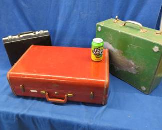 Lot 342. Three cases. The large one is Samsonite
