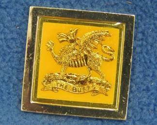 Lot 158. Franklin Mint's sterling silver The Buffs United Kingdom ingot from "The World's Greatest Regiments" weighing 14.30 grams.. All 50 emblems and the wooden display case will be sold separately in this auction