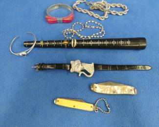 Lot 210. Costume jewelry and knives