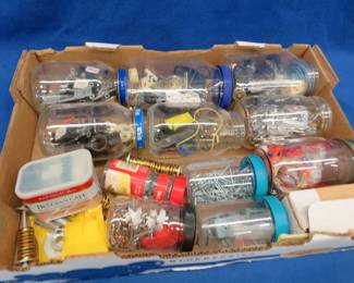 Lot 404. Jars of fasteners, hinges, switches, and more