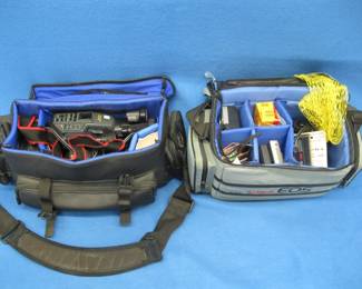 Lot 408. Untested JVC compact VHS recorder with accessories and a Canon camera bag with lots of things that aren't cameras