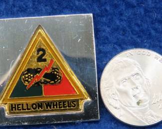 Lot 201. Franklin Mint's sterling silver 2nd Armoured Division U.S.A. ingot from "The World's Greatest Regiments" weighing 14.38 grams.. All 50 emblems and the wooden display case will be sold separately in this auction