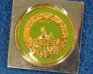 Lot 102. Franklin Mint's sterling silver The South Wales Borderers United Kingdom ingot from "The World's Greatest Regiments" weighing 14.30 grams.. All 50 emblems and the wooden display case will be sold separately in this auction
